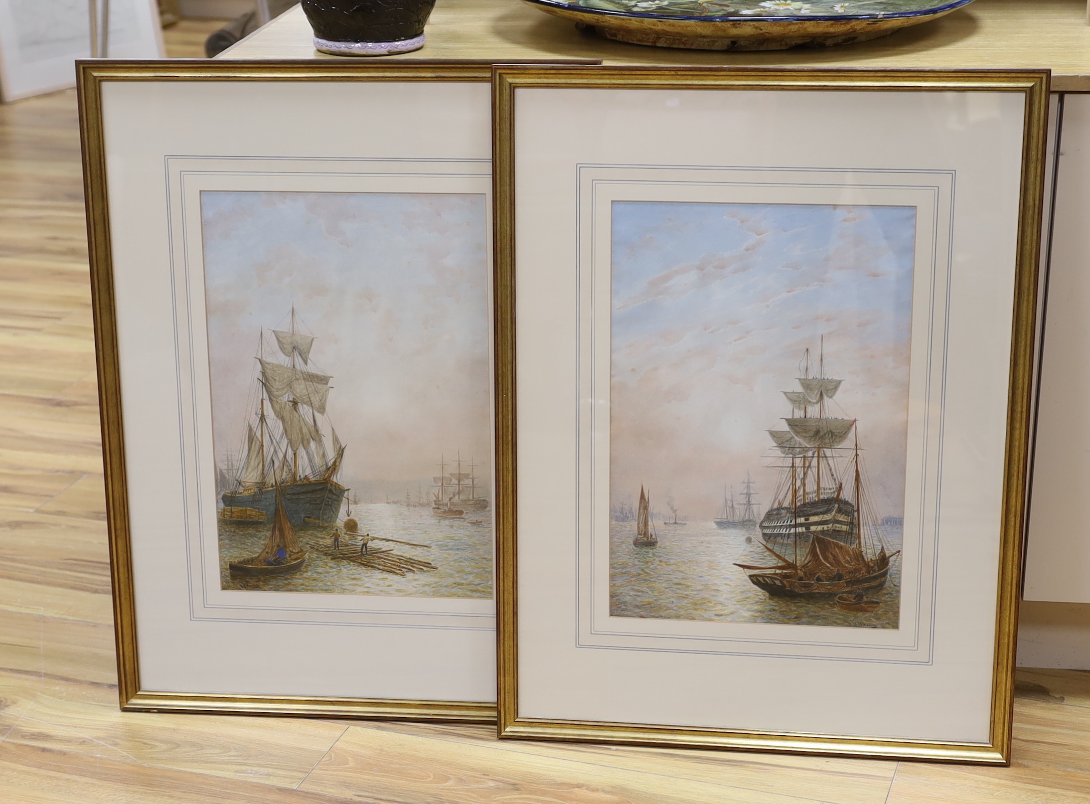 Bernard Benedict Hemy (British, 1844-1910), pair of watercolours, Frigates and fishing boats at anchor, each signed 52 x 36cm